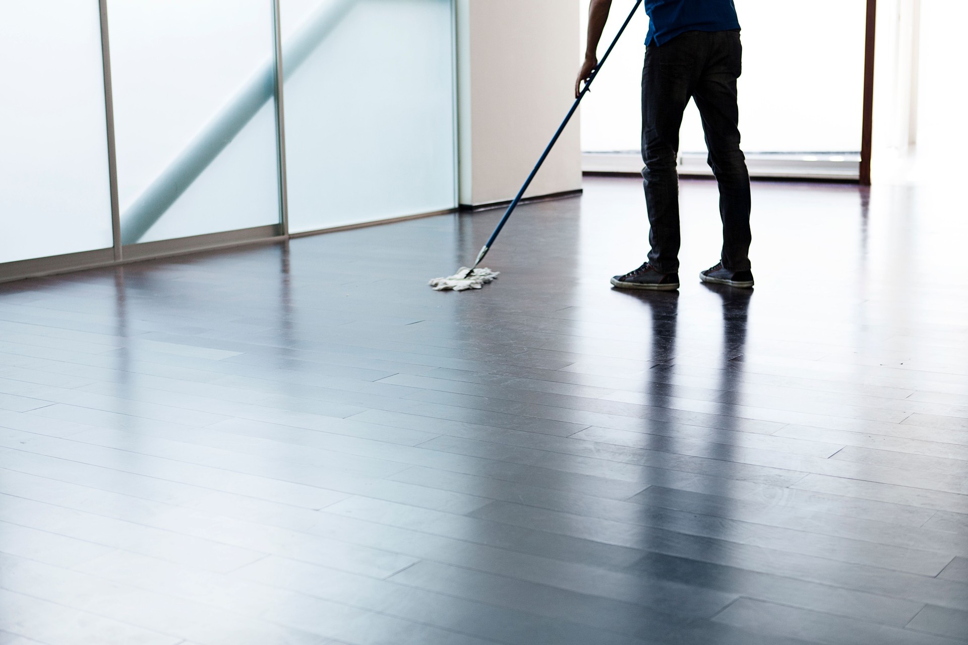 Man cleaning the floor